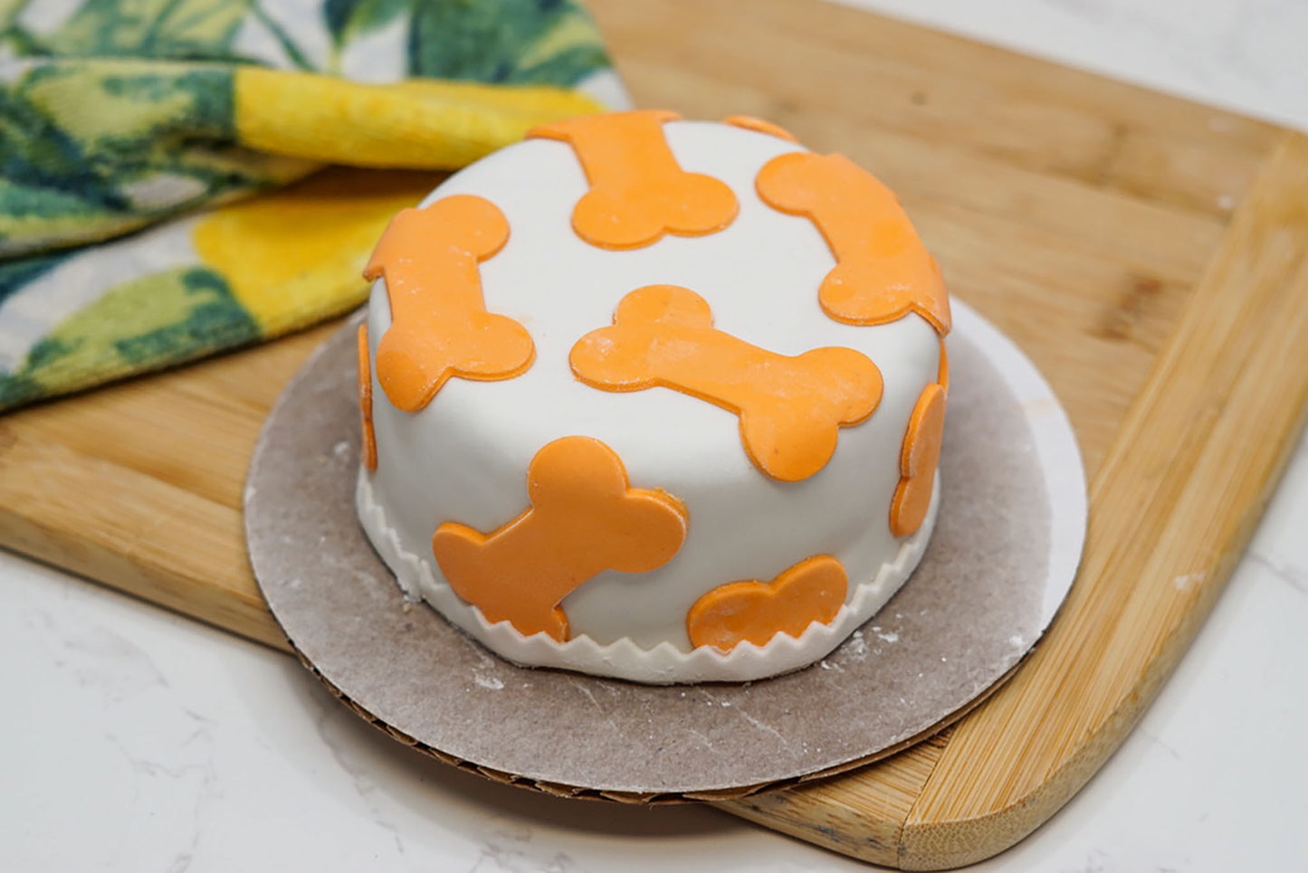 Packaged 4-inch dog birthday cake ready for shipping, handmade dog-friendly cake